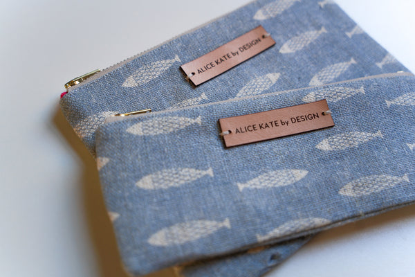 Pez Fish Weathered Blue on Cream Zipper Pouch