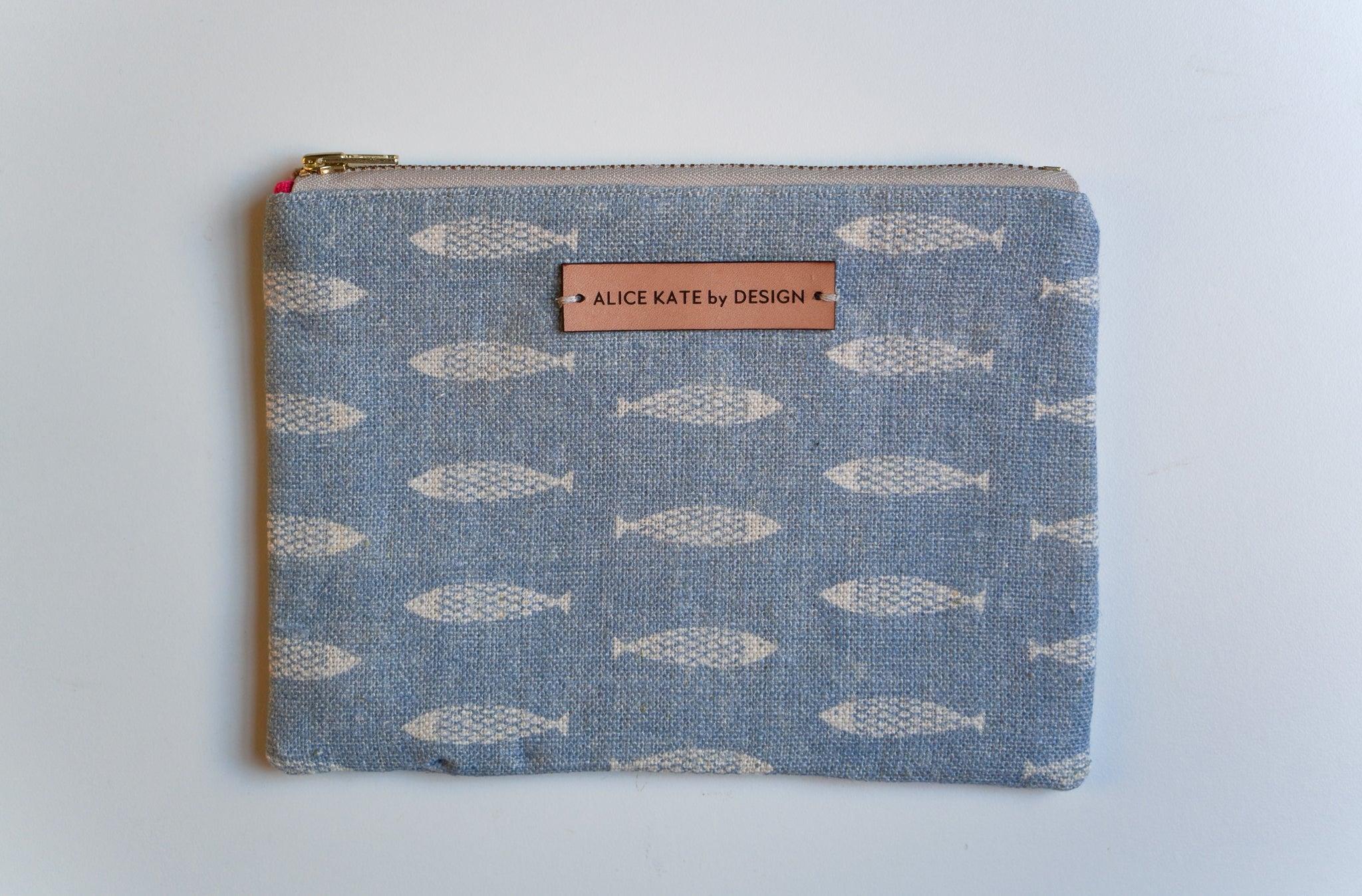 Pez Fish Weathered Blue on Cream Zipper Pouch